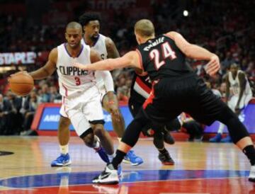 Chris Paul y Mason Plumlee.