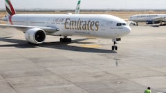 This picture taken on July 17, 2020 shows an Emirates Boeing 777-31H aircraft taxying upon arrival at the Iranian capital Tehran&#039;s Imam Khomeini International Airport. - The UAE&#039;s Emirates airlines landed its first flight in Tehran on July 17 af