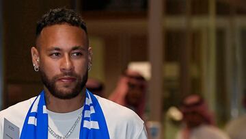 Brazilian forward Neymar arrives to Riyadh on August 18, 2023 after signing for Al-Hilal on a two-year contract. The 31-year-old Brazil forward who will be unveiled as an Al-Hilal player on August 19 after six seasons with French champions Paris Saint-Germain landed in a Riyadh airport equipped with extra security for the occasion. (Photo by AFP)