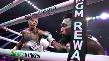 LAS VEGAS, NEVADA - JUNE 15: WBA lightweight champion Gervonta Davis (L) sends Frank Martin to the canvas in the eighth round of a title fight at MGM Grand Garden Arena on June 15, 2024 in Las Vegas, Nevada. Davis retained his title with an eighth-round knockout.   Steve Marcus/Getty Images/AFP (Photo by Steve Marcus / GETTY IMAGES NORTH AMERICA / Getty Images via AFP)