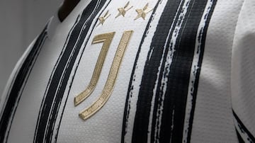 Serie A champions Juventus have released their new home kit, which sees a return to the Turin giants' famous black and white stripes.