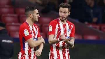Koke y Saúl conversan en un partido del Atlético en el Wanda Metropolitano. Serán titulares ante el Valencia.