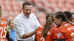 Jul 22, 2020; Sandy, Utah, USA;  Houston Dash head coach James Clarkson cheers his team on during a hydration break in the second half against the Portland Thorns FC at Rio Tinto Stadium. Mandatory Credit: Jeffrey Swinger-USA TODAY Sports