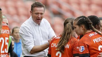 Jul 22, 2020; Sandy, Utah, USA;  Houston Dash head coach James Clarkson cheers his team on during a hydration break in the second half against the Portland Thorns FC at Rio Tinto Stadium. Mandatory Credit: Jeffrey Swinger-USA TODAY Sports