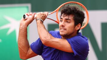 PARIS, FRANCE - JUNE 04: Cristisan Garin of Chile plays a backhand during his Men&#039;s Singles third round match against Marcos Giron of USA during day six of the 2021 French Open at Roland Garros on June 04, 2021 in Paris, France. (Photo by Julian Finney/Getty Images)