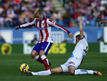 Antoine Griezmann y Cezary Wilk