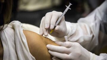 BANGKOK, THAILAND - AUGUST 30: A Thai nurse injects a patient with their first dose of the Pfizer Vaccine at Central Westgate Mall on August 30, 2021 in Bangkok, Thailand. High risk Nonthaburi Province residents, who registered via the &quot;Non Prom&quot