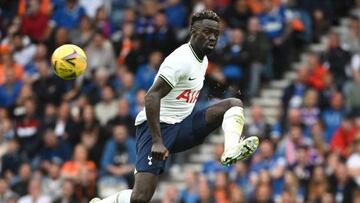 Tottenham Hotspur's Colombian defender Davinson Sanchez (R) eyes the ball as he jumps for it during the friendly football match between Rangers and Tottenham Hotspur at the Ibrox Stadium in Glasgow on July 23, 2022. - RESTRICTED TO EDITORIAL USE. No use with unauthorized audio, video, data, fixture lists, club/league logos or 'live' services. Online in-match use limited to 120 images. An additional 40 images may be used in extra time. No video emulation. Social media in-match use limited to 120 images. An additional 40 images may be used in extra time. No use in betting publications, games or single club/league/player publications. (Photo by Andy Buchanan / AFP) / RESTRICTED TO EDITORIAL USE. No use with unauthorized audio, video, data, fixture lists, club/league logos or 'live' services. Online in-match use limited to 120 images. An additional 40 images may be used in extra time. No video emulation. Social media in-match use limited to 120 images. An additional 40 images may be used in extra time. No use in betting publications, games or single club/league/player publications. / RESTRICTED TO EDITORIAL USE. No use with unauthorized audio, video, data, fixture lists, club/league logos or 'live' services. Online in-match use limited to 120 images. An additional 40 images may be used in extra time. No video emulation. Social media in-match use limited to 120 images. An additional 40 images may be used in extra time. No use in betting publications, games or single club/league/player publications. (Photo by ANDY BUCHANAN/AFP via Getty Images)