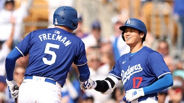 GLENDALE, ARIZONA - FEBRUARY 27: Shohei Ohtani #17 celebrates with Freddie Freeman #5 of the Los Angeles Dodgers after hitting a two-run home run in the fifth inning inning during a game against the Chicago White Sox at Camelback Ranch on February 27, 2024 in Glendale, Arizona.   Christian Petersen/Getty Images/AFP (Photo by Christian Petersen / GETTY IMAGES NORTH AMERICA / Getty Images via AFP)