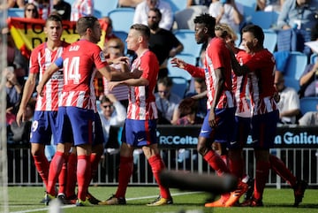 The Atlético Madrid players celebrate Gameiro's goal.