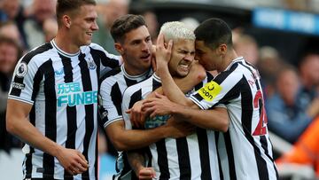 Soccer Football - Premier League - Newcastle United v Brentford - St James' Park, Newcastle, Britain - October 8, 2022 Newcastle United's Bruno Guimaraes celebrates scoring their third goal with Miguel Almiron and teammates Action Images via Reuters/Lee Smith EDITORIAL USE ONLY. No use with unauthorized audio, video, data, fixture lists, club/league logos or 'live' services. Online in-match use limited to 75 images, no video emulation. No use in betting, games or single club /league/player publications.  Please contact your account representative for further details.