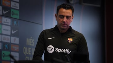 Barcelona Spanish coach Xavi arrives for a press conference at the Joan Gamper training ground in Sant Joan Despi, near Barcelona, on May 25, 2024. Sacked Barcelona coach Xavi Hernandez said today he was leaving the club with a "clear conscience". President Joan Laporta took the decision to remove the former midfield great yesterday, mere weeks after saying he was delighted Xavi was staying for the final year of his contract. (Photo by MANAURE QUINTERO / AFP)