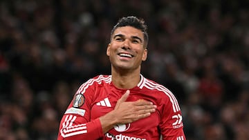 Manchester United's Brazilian midfielder #18 Casemiro celebrates after scoring Manchester United's second goal during the UEFA Europa League semi final second leg football match between Manchester United and Athletic Club Bilbao at Old Trafford stadium in Manchester, north west England, on May 8, 2025. (Photo by Oli SCARFF / AFP)