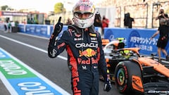 Red Bull Racing's Dutch driver Max Verstappen celebrates after taking poll position in the qualifying session for the Formula One Japanese Grand Prix at the Suzuka circuit, Mie prefecture on September 23, 2023. (Photo by Peter PARKS / AFP)