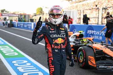 Red Bull Racing's Dutch driver Max Verstappen celebrates after taking poll position in the qualifying session for the Formula One Japanese Grand Prix at the Suzuka circuit, Mie prefecture on September 23, 2023. (Photo by Peter PARKS / AFP)