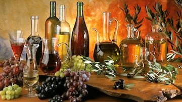 Still life with wine oil olives grapes (Photo by Art Images via Getty Images) VINO Y ACEITE DE OLIVA UVAS ACEITUNAS