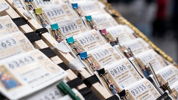 MADRID, SPAIN - NOVEMBER 02: Several tickets from the Doña Manolita lottery administration, on 02 November, 2021 in Madrid, Spain. The Madrid lottery administration Doña Manolita presents important queues waiting to buy a number of the Christmas Lottery Draw 2021, which since July have been on sale to distribute 2,408 million euros in prizes. (Photo By A. Perez Meca/Europa Press via Getty Images) LOTERIA NAVIDAD SORTEO