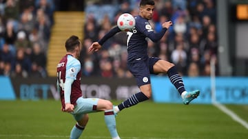 Burnley&#039;s Welsh defender Connor Roberts (L) vies with Manchester City&#039;s Portuguese defender Joao Cancelo (R) during the English Premier League football match between Burnley and Manchester City at Turf Moor in Burnley, north west England on Apri