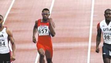 <b>RIVALES A BATIR. </b>Gay (EE UU), Buckland (Mauricio) y Gatlin (EE UU), en la segunda semifinal de ayer.