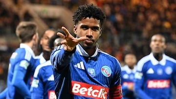 Stasbourg's Brazilian midfielder #08 Andrey Dos Santos celebrates after scoring his team's first goal during the French Cup round 64 football match between RC Calais and RC Strasbourg at the Stade de l'Epopee in Calais on December 21, 2024. (Photo by FRANCOIS NASCIMBENI / AFP)
