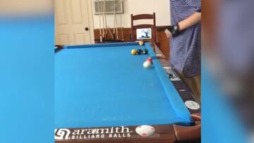 Young pool player with his trick shots? Cue action...