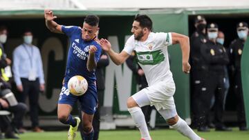  Mariano Diaz  of Real Madrid (L) and Bigas of Elche CF  during  La Liga  match between Elche cf and Real  Madrid   at Martinez Valero   Stadium on October 30, 2021.