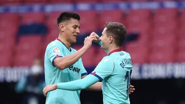 MADRID, SPAIN - FEBRUARY 20: Jorge De Frutos of Levante UD celebrates with teammate Oscar Duarte after scoring his team&#039;s second goal during the La Liga Santander match between Atletico de Madrid and Levante UD at Estadio Wanda Metropolitano on Febru