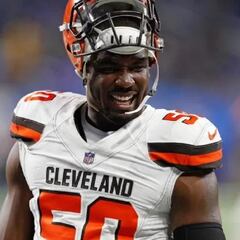 How did former Browns defensive end Chris Smith die?