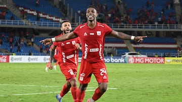 America de Cali's defender #24 Jean Carlos Pestana celebrates scoring his team's first goal during the Copa Sudamericana group stage football match between Colombia's America de Cali and Uruguay's Racing at the Olimpico Pascual Guerrero stadium in Cali, Valle del Cauca, Colombia, on May 27, 2025. (Photo by JOAQUIN SARMIENTO / AFP) (Photo by JOAQUIN SARMIENTO/AFP via Getty Images)
