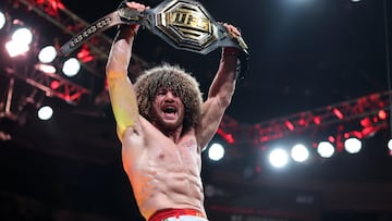 Jun 7, 2025; Newark, New Jersey, UNITED STATES; Merab Dvalishvili (red gloves) reacts after defeating Sean O’Malley (not pictured) in a bantamweight title fight during UFC 316 at Prudential Center. Mandatory Credit: Vincent Carchietta-Imagn Images
