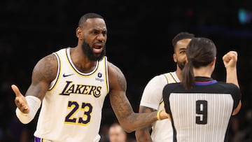 PHOENIX, ARIZONA - FEBRUARY 25: LeBron James #23 of the Los Angeles Lakers reacts to referee Natalie Sago #9 after a foul call during the second half of the NBA game against the Phoenix Suns at Footprint Center on February 25, 2024 in Phoenix, Arizona. The Suns defeated the Lakers 123-113. NOTE TO USER: User expressly acknowledges and agrees that, by downloading and or using this photograph, User is consenting to the terms and conditions of the Getty Images License Agreement.   Christian Petersen/Getty Images/AFP (Photo by Christian Petersen / GETTY IMAGES NORTH AMERICA / Getty Images via AFP)