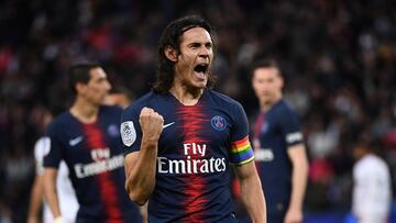 Paris Saint-Germain's Uruguayan forward Edinson Cavani celebrates after scoring a goal during the French L1 football match between Paris Saint-Germain (PSG) and Dijon at the Parc des Princes stadium in Paris on May 18, 2019. (Photo by Anne-Christine