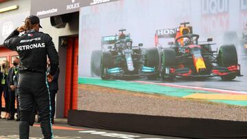 Mercedes' British driver Lewis Hamilton looks at a replay of the race after the Emilia Romagna Formula One Grand Prix at the Autodromo Internazionale Enzo e Dino Ferrari race track in Imola, Italy, on April 18, 2021. (Photo by Bryn Lennon / POOL / AFP)