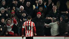 After Paul Mullin missed a penalty that would have put Wrexham ahead, stoppage-time goals by Billy Sharp and Sander Berge sent Sheffield United into the fifth round.