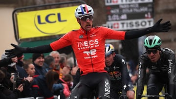 INEOS Grenadiers' French rider Dorian Godon celebrates as he crosses the finish line to win the 7th stage of the Paris-Nice cycling race, 47 km between Le Broc and Isola-Village, on March 14, 2026. Due to deteriorating weather conditions, the route of stage 7 has been changed to a 47 km race from Le Broc to Isola. (Photo by Anne-Christine POUJOULAT / AFP)
