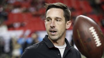 FILE - In this Dec. 18, 2016, file photo, Atlanta Falcons offensive coordinator Kyle Shanahan walks on the turf before an NFL football game against the San Francisco 49ers in Atlanta. Shanahan, expected to be one of the top targets for teams looking to replace head coaches, could be available for interviews this week. Falcons coach Dan Quinn said Monday, Jan. 2, 2017, âI'm sure he will be contacted by some teams.â (AP Photo/John Bazemore, File)