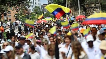 People attend a march in support of Colombian Senator Miguel Uribe Turbay of the opposition Democratic Center party, who was shot during a campaign event, in Bogota, Colombia, June 8, 2025. REUTERS/Luisa Gonzalez