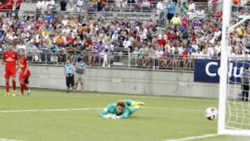 Real's Mateo Kovacic fires a shot against the post.