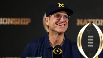 HOUSTON, TEXAS - JANUARY 08: Head coach Jim Harbaugh of the Michigan Wolverines reacts during the press conference after defeating the Washington Huskies during the 2024 CFP National Championship game at NRG Stadium on January 08, 2024 in Houston, Texas. Michigan defeated Washington 34-13.   Maddie Meyer/Getty Images/AFP (Photo by Maddie Meyer / GETTY IMAGES NORTH AMERICA / Getty Images via AFP)