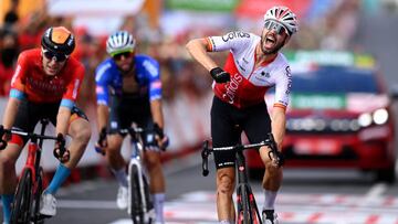 CISTIERNA, SPAIN - AUGUST 26: Jesús Herrada Lopez of Spain and Team Cofidis celebrates at finish line as stage winner ahead of Fred Wright of United Kingdom and Team Bahrain Victorious during the 77th Tour of Spain 2022, Stage 7 a 190km stage from Camargo to Cistierna / #LaVuelta22 / #WorldTour / on August 26, 2022 in Cistierna, Spain. (Photo by Justin Setterfield/Getty Images)
