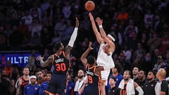 Nov 26, 2023; New York, New York, USA; Phoenix Suns guard Devin Booker (1) takes the game winning three-point shot in the fourth quarter against the New York Knicks at Madison Square Garden. Mandatory Credit: Wendell Cruz-USA TODAY Sports