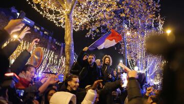 France fans celebrated on the streets of Paris after they beat Morocco 2-0 to seal their spot in the World Cup final on Sunday, when they face Argentina.