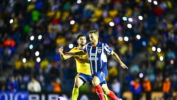 Henry Martin (L) of America fights for the ball with Sergio Canales of Monterrey during the 14th round match between America and Monterrey as part of the Liga BBVA MX, Torneo Apertura 2024 at Ciudad de los Deportes Stadium on October 27, 2024 in Mexico City, Mexico.