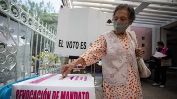 MEXICO CITY, MEXICO - APRIL 10: A woman casts her ballot at a polling station during a national referendum on whether Mexico's President Andres Manuel Lopez Obrador should end his six-year term or continue, in Mexico City, Mexico on April 10, 2022. (Photo by Daniel Cardenas/Anadolu Agency via Getty Images)