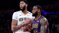 LOS ANGELES, CALIFORNIA - DECEMBER 21: LeBron James #23 of the Los Angeles Lakers guards Anthony Davis #23 of the New Orleans Pelicans during a 112-104 Laker win at Staples Center on December 21, 2018 in Los Angeles, California. NOTE TO USER: User expressly acknowledges and agrees that, by downloading and or using this photograph, User is consenting to the terms and conditions of the Getty Images License Agreement.   Harry How/Getty Images/AFP
 == FOR NEWSPAPERS, INTERNET, TELCOS &amp; TELEVISION USE ONLY ==