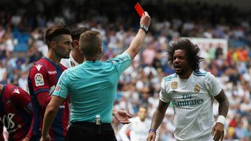 Soccer Football - Spanish La Liga Santander - Real Madrid vs Levante - Madrid, Spain - September 9, 2017   Real Madrid&rsquo;s Marcelo is shown a red card by referee Alejandro Jose Hernandez Hernandez   REUTERS/Susana Vera