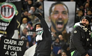 Juventus' supporters cheer on their team during the Italian Serie A soccer match between ACF Fiorentina and Juventus FC