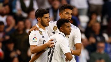 Soccer Football - LaLiga - Real Madrid v Espanyol - Santiago Bernabeu, Madrid, Spain - March 11, 2023 Real Madrid's Marco Asensio celebrates scoring their third goal with teammates REUTERS/Juan Medina