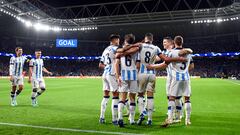 Real Sociedad players celebrate their third goal