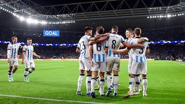 Real Sociedad players celebrate their third goal